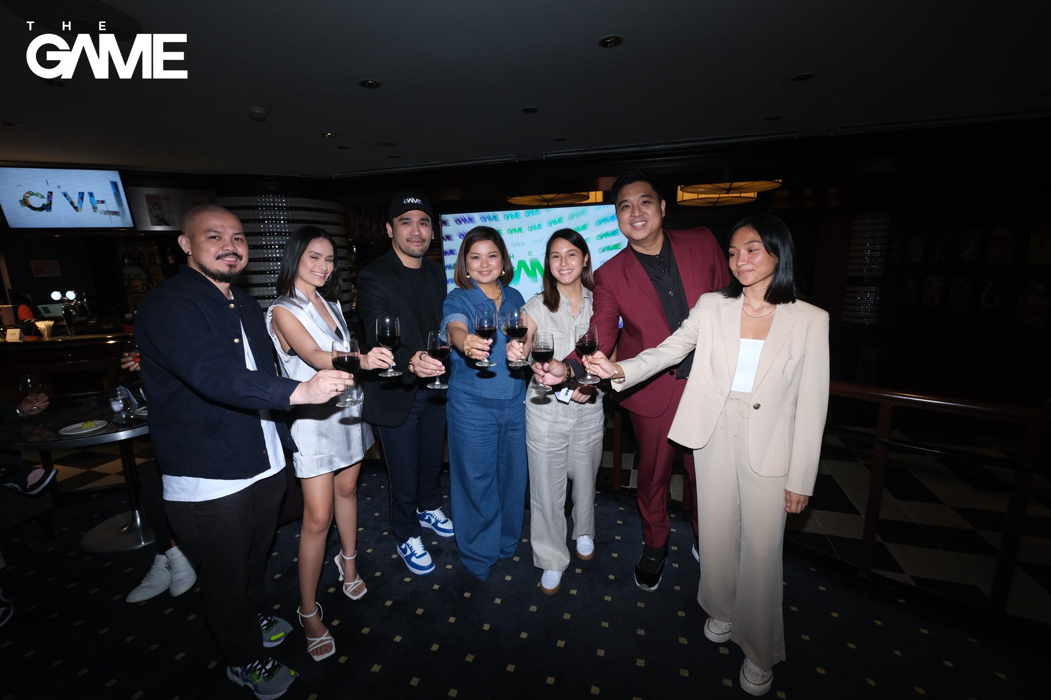 The GAME's team toasting the brand's launch