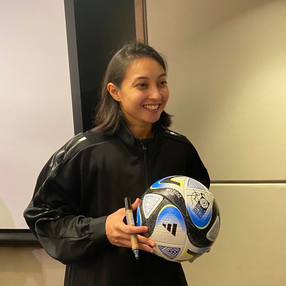 Filipinas player Inna Palacios signs the Women's World Cup official match ball