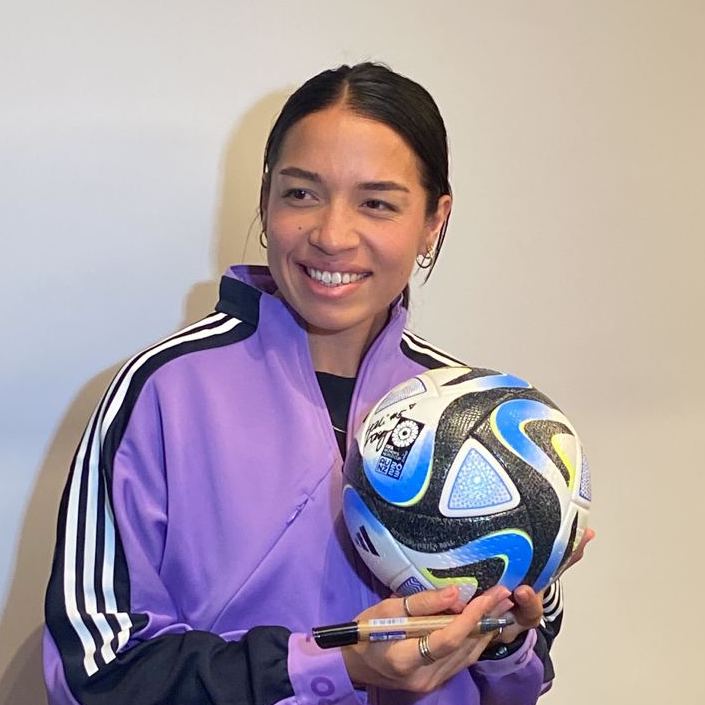 Filipinas player Hali Long signs the Women's World Cup official match ball