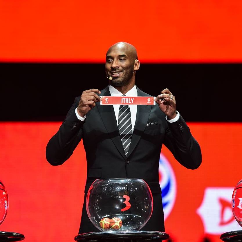 Kobe Bryant, World Cup Ambassador shows a ticket of Italy during the draw ceremony of 2019 FIBA Basketball World Cup in Shenzhen