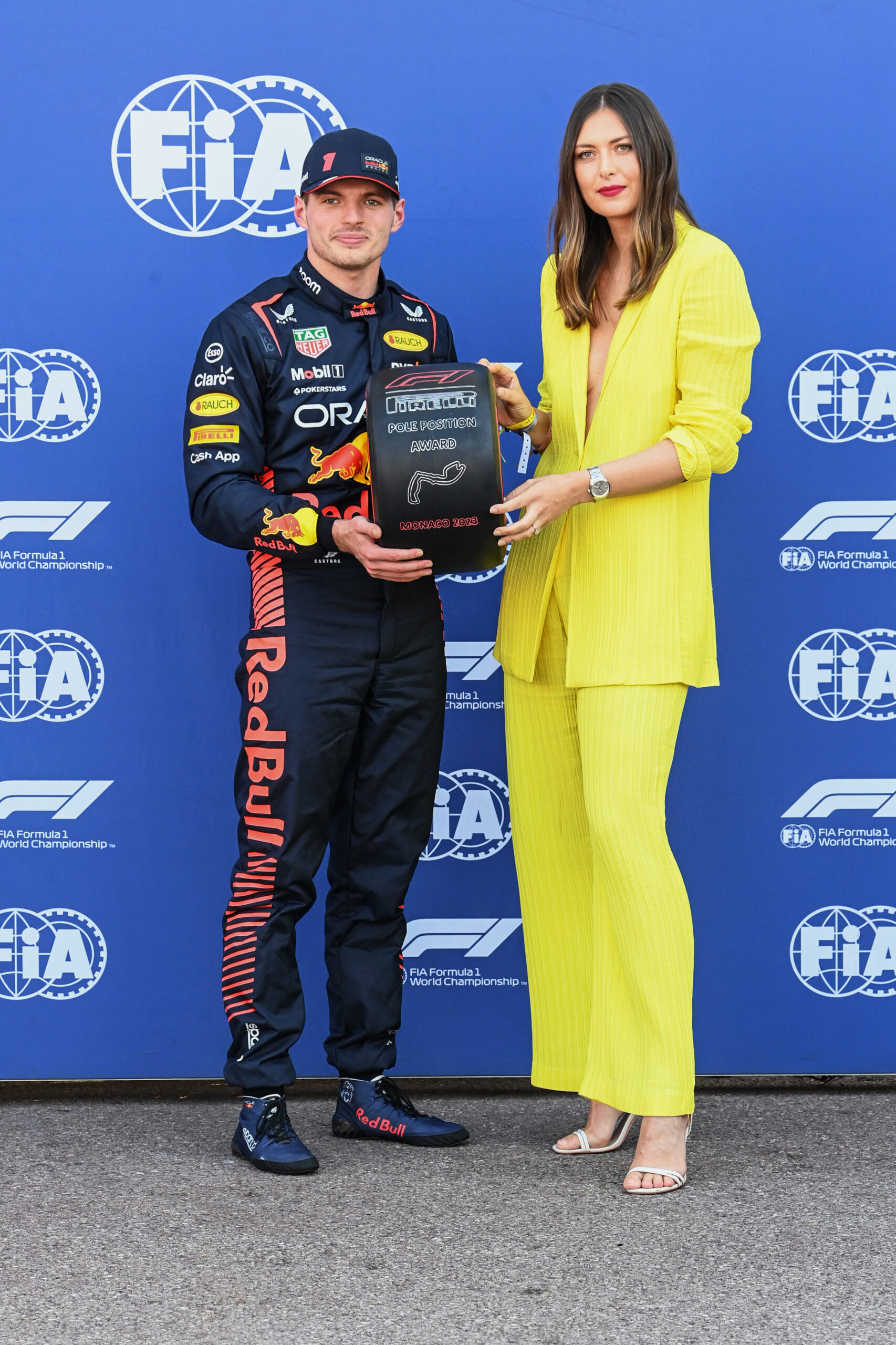 Maria Sharapova awarding Max Verstappen the F1 Pole Position Award at the 2023 Monaco GP