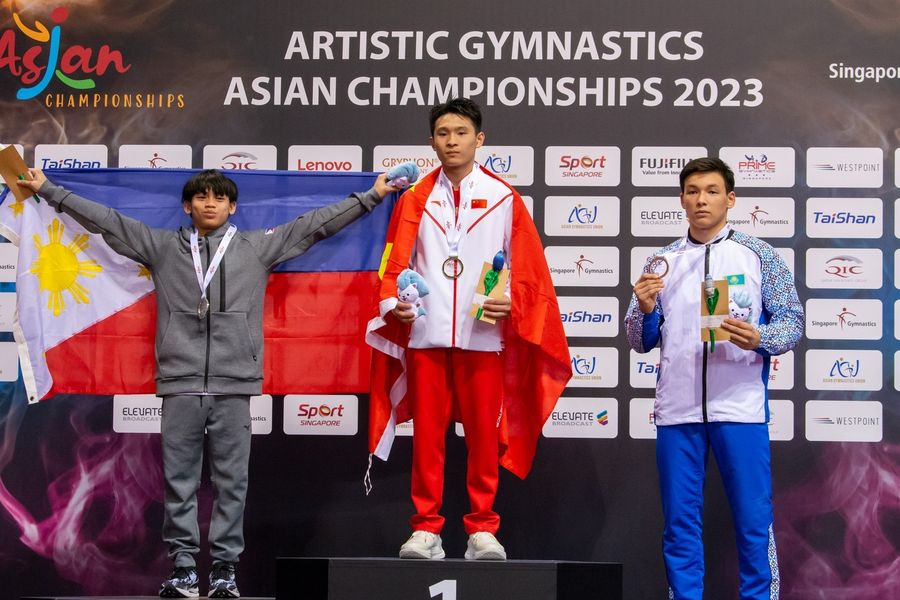 Karl Yulo (left) bags a silver medal at the 2023 Artistic Gymnastics Asian Championships. 