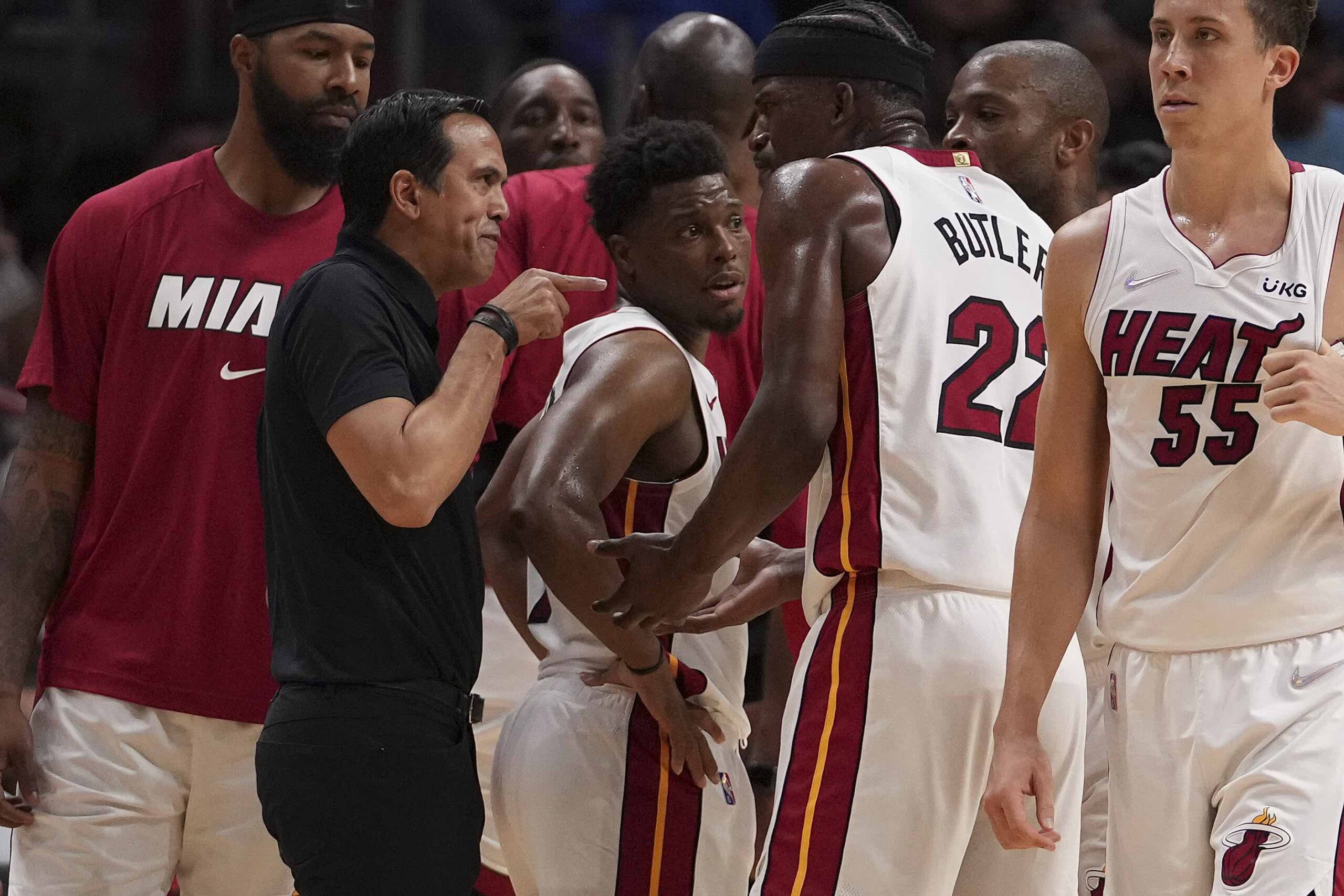 Miami Heat head coach Erik Spoelstra in an argument with star player Jimmy Butler