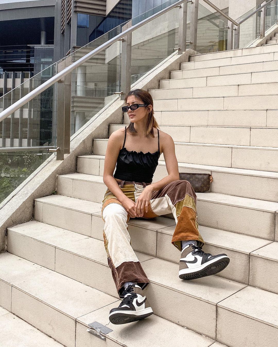 Kim Kianna Dy wearing Air Jordan 1s in 'Dark Mocha'