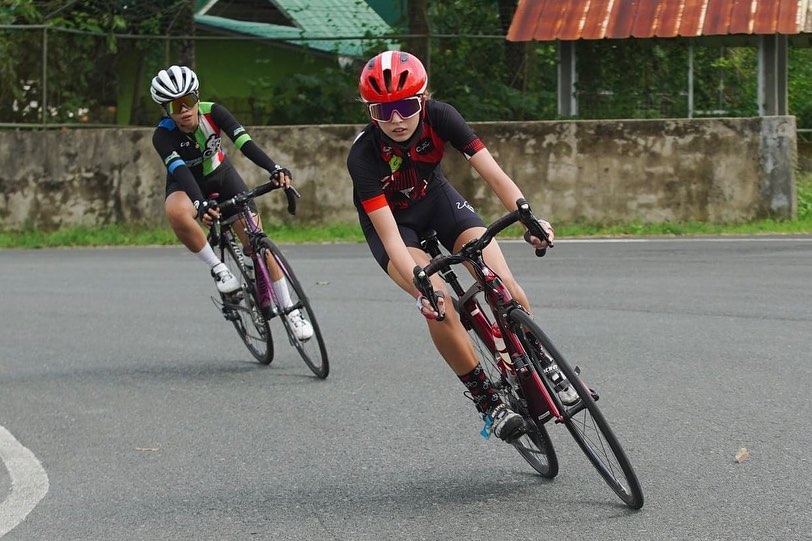Filipino triathlete Kira Ellis (in red helmet)