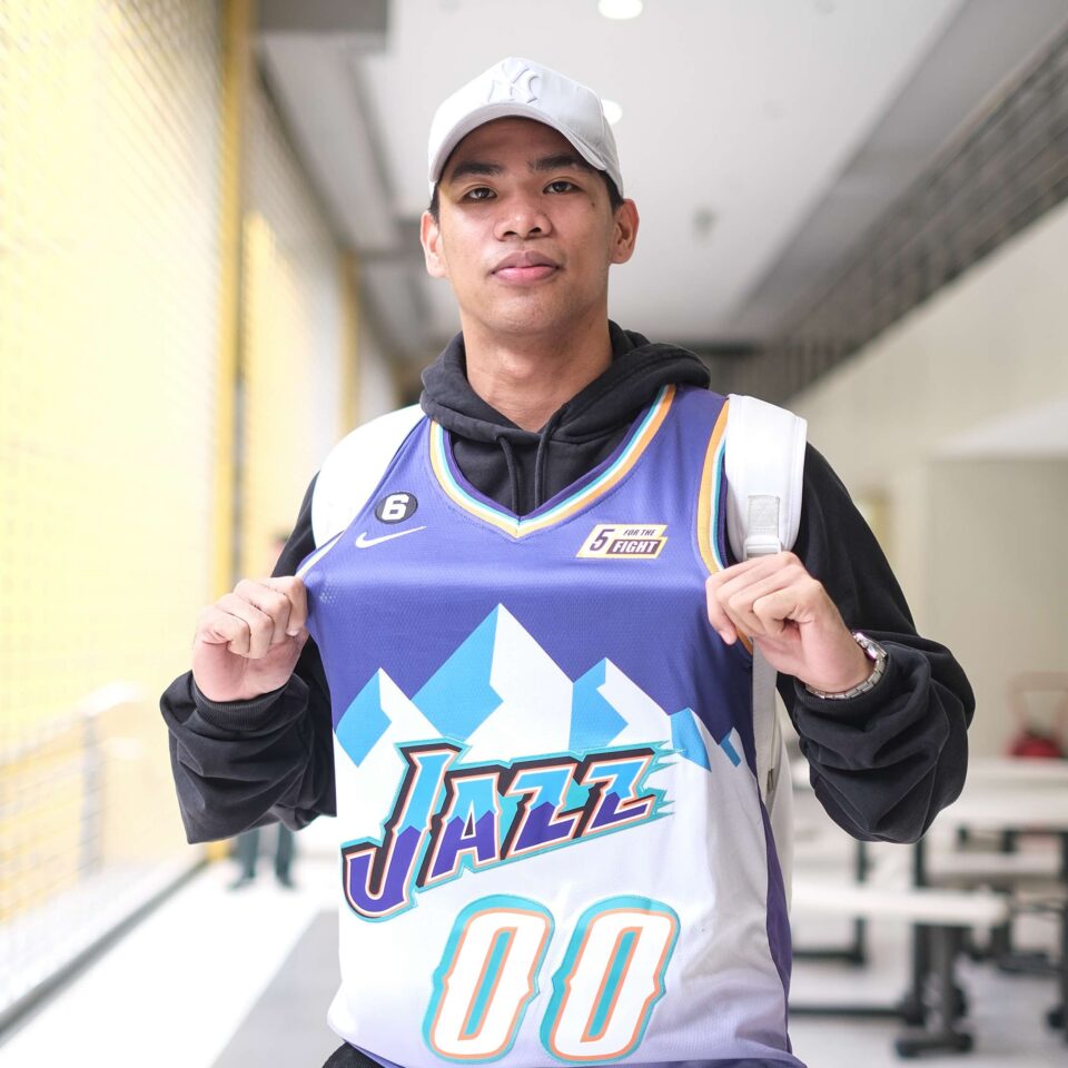 Mark Nonoy wearing a Utah Jazz NBA jersey