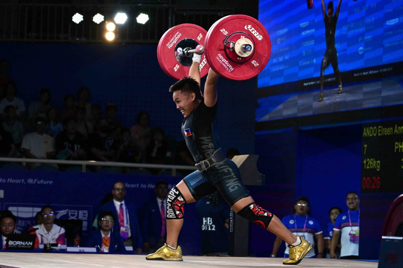 Elreen Ando wins a bronze medal for weightlifting at the 19th Asian Games