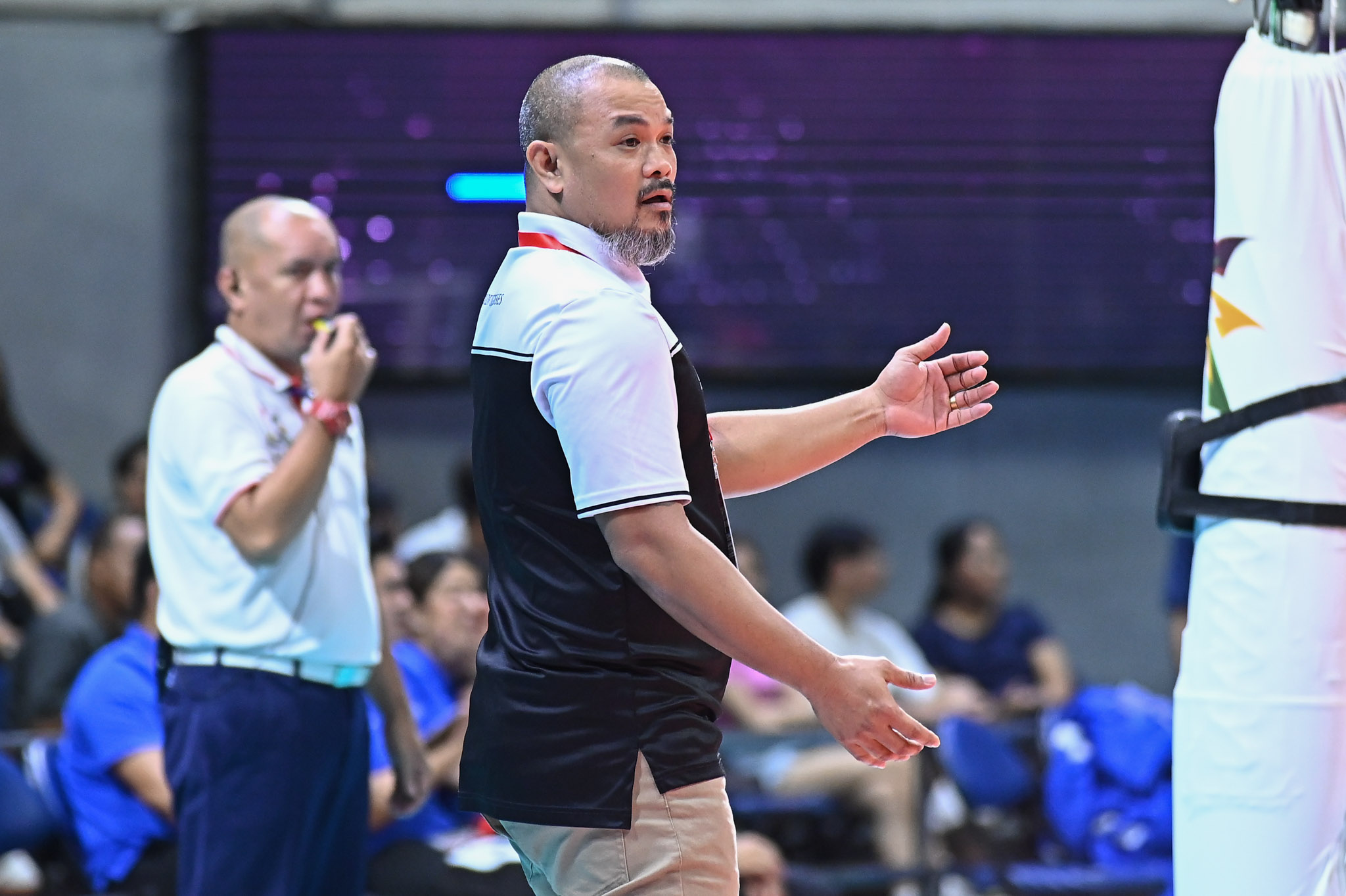 One of the volleyball coaches on double duty Kung Fu Reyes