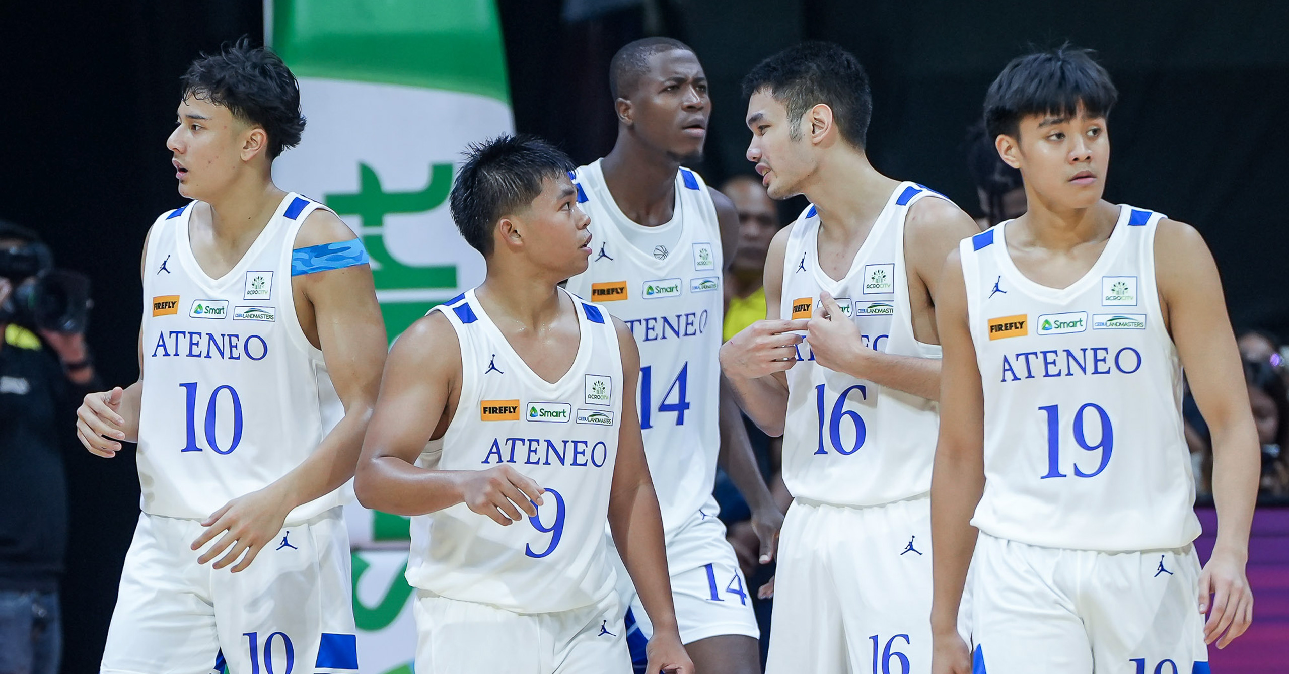 The Ateneo Blue Eagles' Shawn Tuano, Jared Bahay and Josh Lazaro