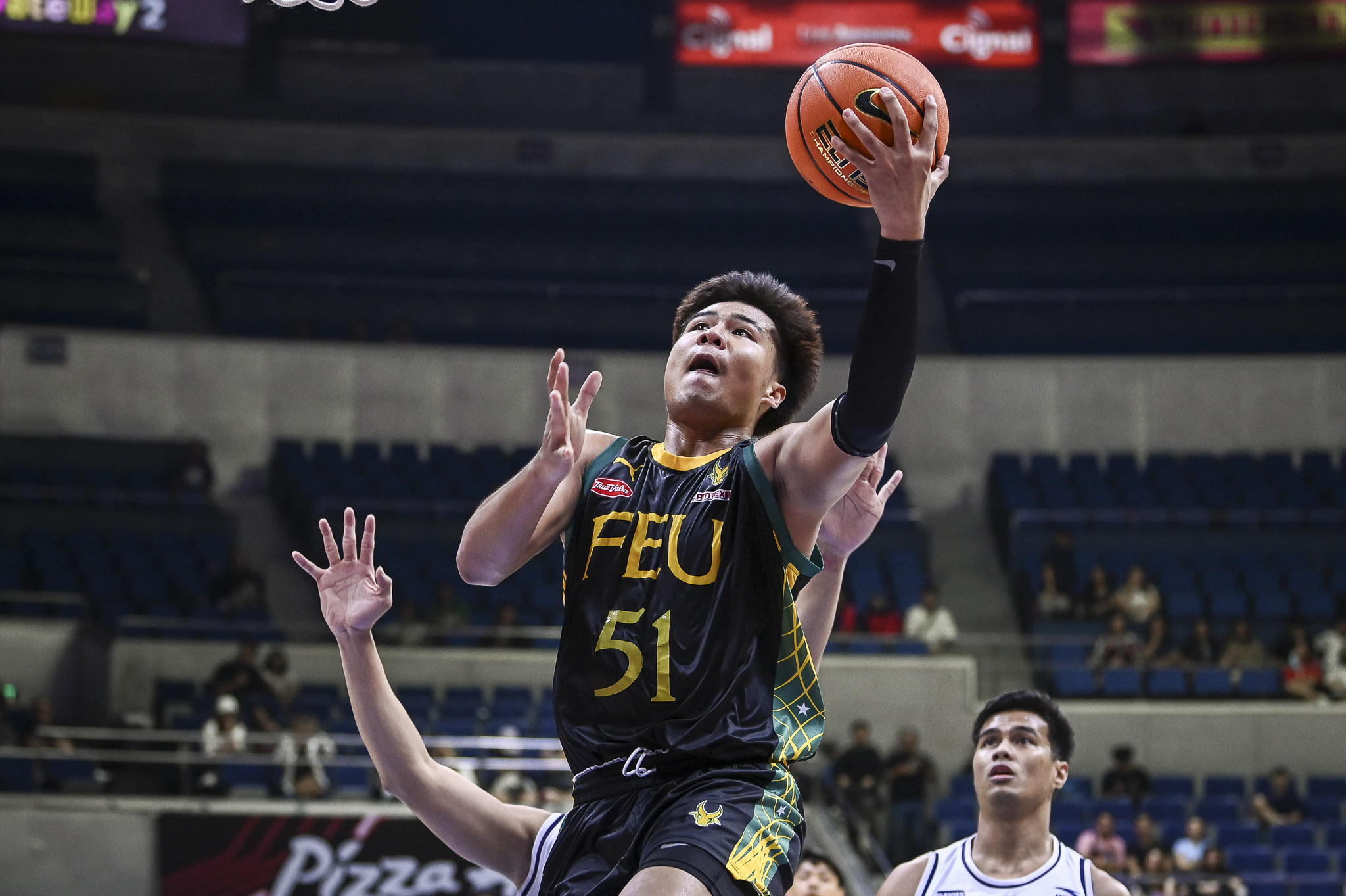 FEU's Veejay Pre against the Adamson Soaring Falcons