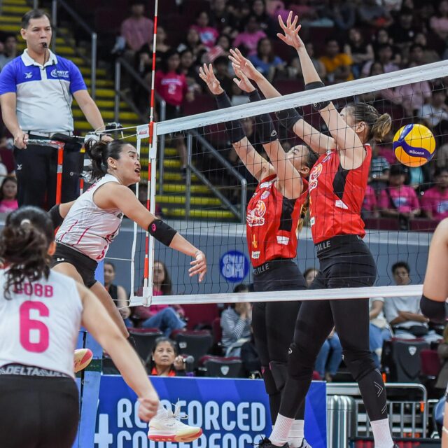 A shot of Akari spiker Grethcel Soltones against PLDT's Fiola Ceballos and Mika Reyes