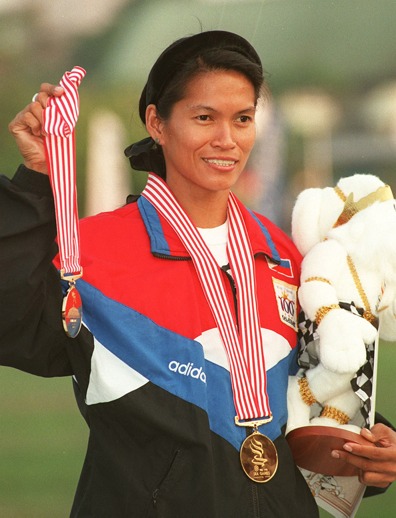 Afp_19971020_sahk971018110460_v1_highres_seagamesphilippinesmuros - the game The Top 10 Most Influential Filipina Athletes Of All Time: Elma Muros-Posadas (track and field)