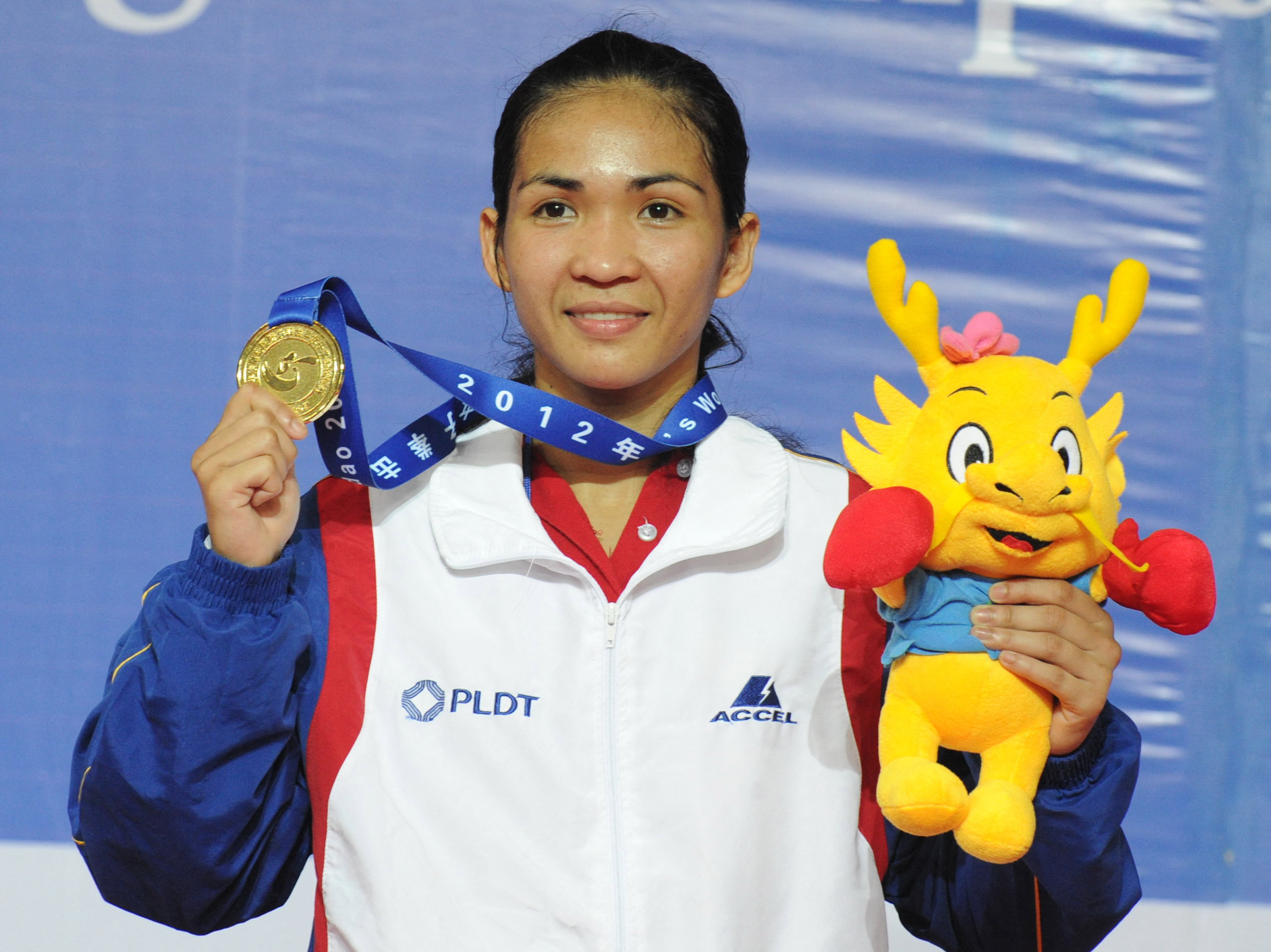 Afp_20120519_xxjpbee001225_20120519_tppfn1a001_v1_highres_china - the game The Top 10 Most Influential Filipina Athletes Of All Time: Josie Gabuco (boxing)