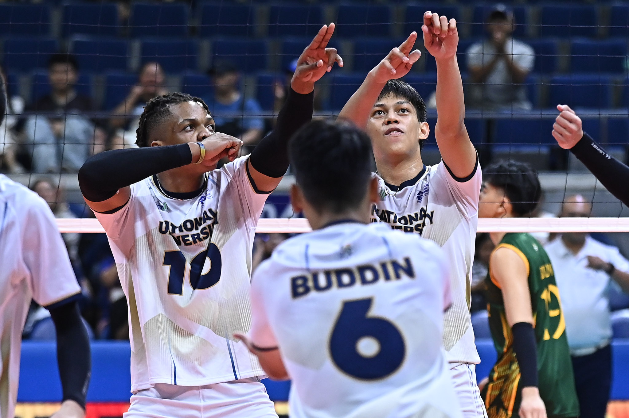 Uaap 87 mvb nu vs feu- obed mukaba leo ordiales-2947 - the game The joint celebration by NU Bulldogs Mukaba and Ordiales in question.