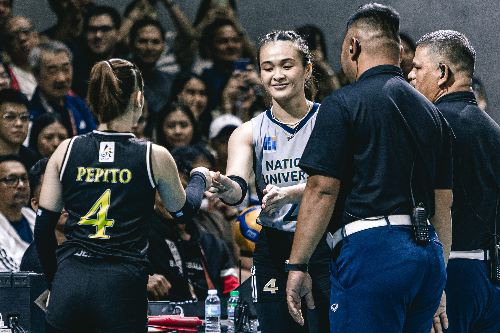 Uaap 87 wvb ust v nu-41 - the game Bella Belen during the provisional coin toss with UST captain and longtime friend Detdet Pepito.